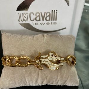 COPY - Just Cavalli goldtone bracelet. Set with a White Enamel Dragonhead. Lobs…